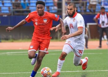 Liberia and Tunisia players contest the ball during a 2026 World Cup qualifier in Monastir