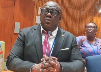Deputy Youth Minister J. Bryant McGill at official meeting before rape and corruption allegations