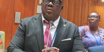 Deputy Youth Minister J. Bryant McGill at official meeting before rape and corruption allegations