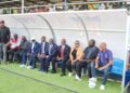Liberian football officials and FIFA delegates seated at Gompa Stadium during the inauguration of the new FIFA-funded artificial turf and mini-pitches to expand grassroots football in Liberia.