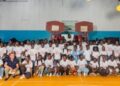 APM Terminals Liberia staff and YMCA Liberia leaders join children in Montserrado County for the 2025 Children Vacation Sports Program closing ceremony.
