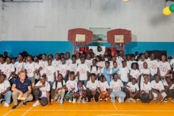 APM Terminals Liberia staff and YMCA Liberia leaders join children in Montserrado County for the 2025 Children Vacation Sports Program closing ceremony.