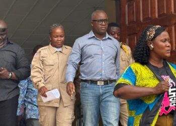 Former LTA chair Abdullai Kamara escorted from court after re-arrest on corruption charges in Monrovia.