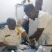 LDEA interim chief Fitzgerald Biago undergoes a drug test in Monrovia as part of new mandatory testing for all officers