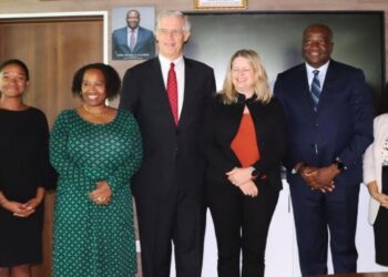 CBL Governor Henry Saamoi (third from right in blue suit) with MCC delegation after discussing Liberia’s infrastructure, financial inclusion, and private-sector growth.