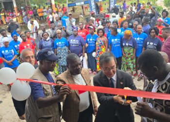 Fishmongers and officials at the ribbon-cutting ceremony for the Japanese-funded FAO fisheries processing facility in Little Bassa, Grand Bassa County