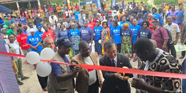 Fishmongers and officials at the ribbon-cutting ceremony for the Japanese-funded FAO fisheries processing facility in Little Bassa, Grand Bassa County