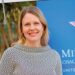 Carrie Monahan, MCC’s Managing Director for Africa, pictured near MCC banner as U.S. delegation arrives in Liberia to assess readiness for a second Compact