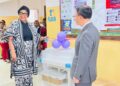 Chinese Ambassador Yin Chengwu and Health Minister Dr. Louise Mapleh Kpoto at donation ceremony for maternal health equipment in Liberia