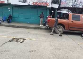 Police raid shuts down the World Trade Center on Gurley Street, Monrovia, sparking outcry from business owners and legislative intervention.