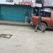 Police raid shuts down the World Trade Center on Gurley Street, Monrovia, sparking outcry from business owners and legislative intervention.