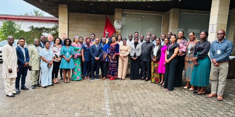 Liberia Revenue Authority Customs Commissioner Saah Saamoi with regional delegates at the IMF-AFRITAC West 2 training workshop in Monrovia on post-clearance audits.