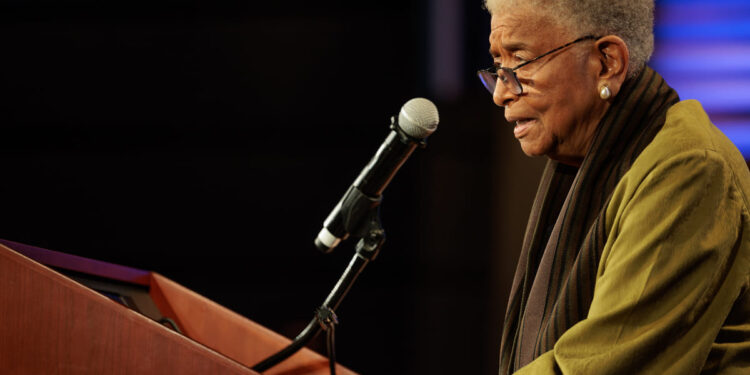 Former Liberian President Ellen Johnson Sirleaf speaks at a podium