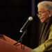 Former Liberian President Ellen Johnson Sirleaf speaks at a podium