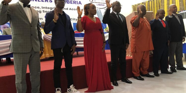 Members of the Engineering Society of Liberia Accreditation and Licensing Board take oath during the induction ceremony at Monrovia City Hall.
