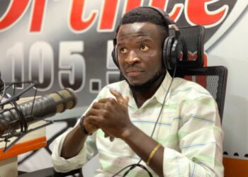 Emmanuel Kollie of the Liberia Broadcasting System, newly elected president of LEGISPOOL, speaking in studio after his victory