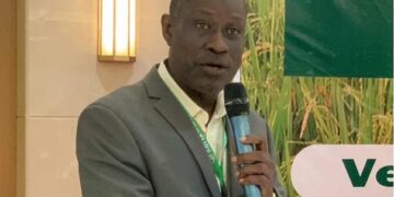 Mohammed Kamara, president of the National Rice Federation of Liberia, speaks during the National Rice Dialogue in Monrovia, urging stronger market access and integrated value chains to protect Liberia’s rice sector and farmers’ livelihoods.