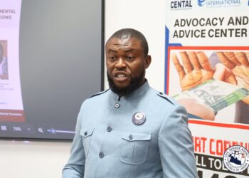 Civil Service Agency Director-General Josiah F. Joekai Jr. addresses reporters in Monrovia after warning public university faculty against a planned go-slow protest in Liberia.