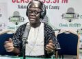 Former Margibi County Superintendent John Buway speaking on a radio program after being nominated Deputy Managing Director for Administration at the Liberia Airport Authority.