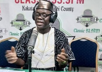 Former Margibi County Superintendent John Buway speaking on a radio program after being nominated Deputy Managing Director for Administration at the Liberia Airport Authority.