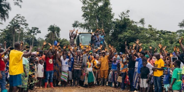 Citizens of Gou, Bong County, Liberia celebrate the launch of an 8-kilometer road project bringing connectivity, healthcare access, and new opportunities