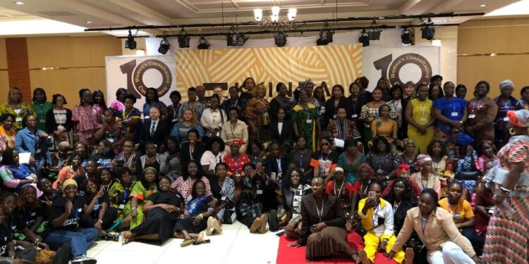 Delegates and partners at the 10th Kvinna Till Kvinna Women’s Consultative Conference in Monrovia, Liberia, celebrating inclusivity and women’s leadership.