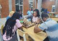 Young Liberians playing chess in Monrovia as the national federation faces leadership and funding challenges