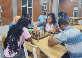 Young Liberians playing chess in Monrovia as the national federation faces leadership and funding challenges