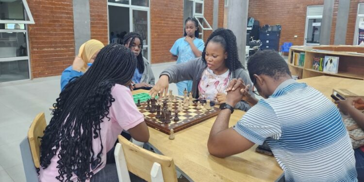 Young Liberians playing chess in Monrovia as the national federation faces leadership and funding challenges