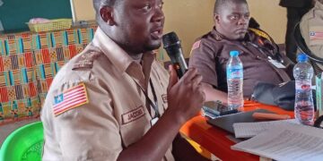 Liberia Immigration Service Deputy Comptroller Jacob Jallah speaking at a public event, now under fire for controversial remarks about drugs.