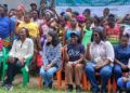 World Bank Country Manager for Liberia Georgia Wallen and partners from Catholic Relief Services, Plan International, and ActionAid pose with women beneficiaries of the Liberia Women Empowerment Project in Zannah Town, Montserrado County, celebrating progress in rural women’s financial literacy, savings groups, and small enterprise development