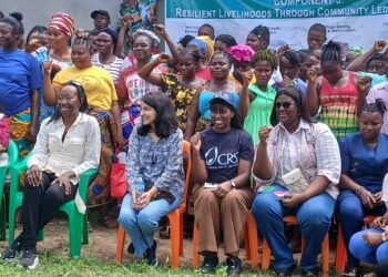 World Bank Country Manager for Liberia Georgia Wallen and partners from Catholic Relief Services, Plan International, and ActionAid pose with women beneficiaries of the Liberia Women Empowerment Project in Zannah Town, Montserrado County, celebrating progress in rural women’s financial literacy, savings groups, and small enterprise development