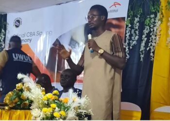 Assistant Labor Minister Emmanuel Barnes speaks during the signing of a Collective Bargaining Agreement between ArcelorMittal Liberia and the United Workers Union in Buchanan, Grand Bassa County.