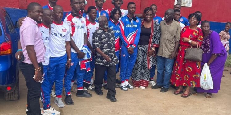 Liberia U-16 basketball team poses with supporters before departing for the 2025 FIBA Afrobasket Youth Championship in Kigali, Rwanda.