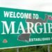 Welcome to Margibi County road sign highlighting the center of political tensions over government representation in Liberia.