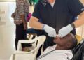 A healthcare worker providing free dental treatment during CARE Inc.’s weeklong outreach in Montserrado County, Liberia, which served over 5,000 residents.