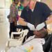 A healthcare worker providing free dental treatment during CARE Inc.’s weeklong outreach in Montserrado County, Liberia, which served over 5,000 residents.