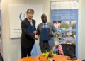 Liberia’s Agriculture Minister Alexander Nuetah and IAEA Deputy Director General Hua Liu sign a five-year nuclear technology cooperation framework in Vienna