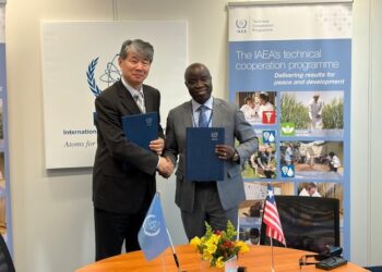 Liberia’s Agriculture Minister Alexander Nuetah and IAEA Deputy Director General Hua Liu sign a five-year nuclear technology cooperation framework in Vienna