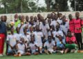 Youth football team celebrates during the Play For Peace Tournament in Monrovia, Liberia, as the event expands to include West African teams