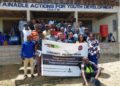 Community members, police, magistrates, and prison officials gather in Sanniquellie for a Rescue Alternatives Liberia awareness forum on criminal justice roles