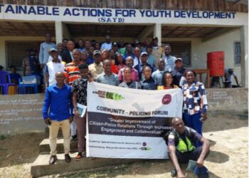 Community members, police, magistrates, and prison officials gather in Sanniquellie for a Rescue Alternatives Liberia awareness forum on criminal justice roles