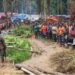 Joint security forces oversee the eviction of over 2,000 illegal occupants from Sapo National Park in Liberia, part of a crackdown on environmental crimes and transnational threats.