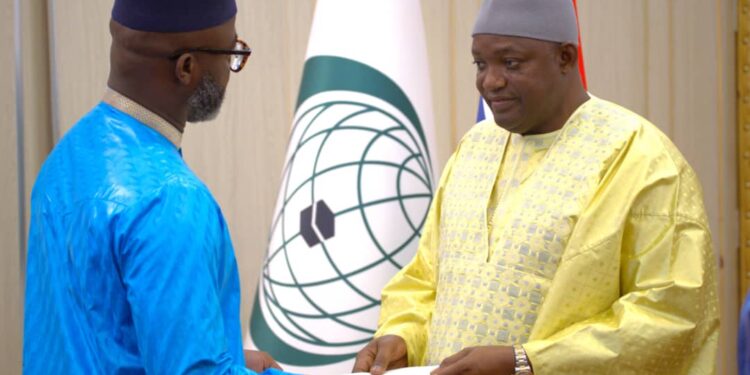 Liberian Ambassador Ali Sylla presents letter of credence to Gambian President Adama Barrow during a ceremony in Banjul, The Gambia