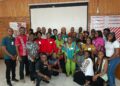 Teach For Liberia alumni and staff pose for a group photo during the organization’s first-ever alumni retreat in Monrovia