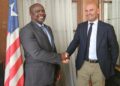 Liberia’s Ambassador to France Dr. Teeko Yorlay shakes hands with C3Medical CEO Jerome Soistier in Paris to discuss health sector partnership