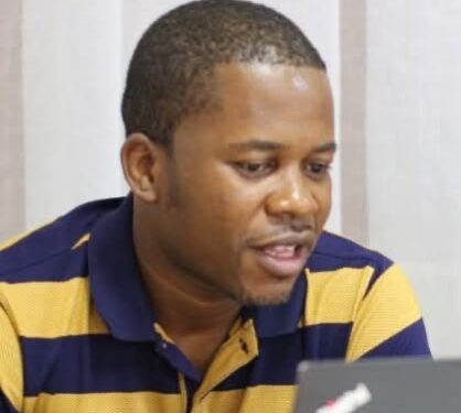 Former Liberia Chess Federation president Thomas Karyah speaking during an earlier meeting before resigning amid an escalating leadership feud.