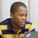 Former Liberia Chess Federation president Thomas Karyah speaking during an earlier meeting before resigning amid an escalating leadership feud.