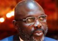 George Weah during his presidency, criticized for failing to implement Liberia’s National Sports Policy