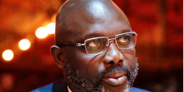 George Weah during his presidency, criticized for failing to implement Liberia’s National Sports Policy